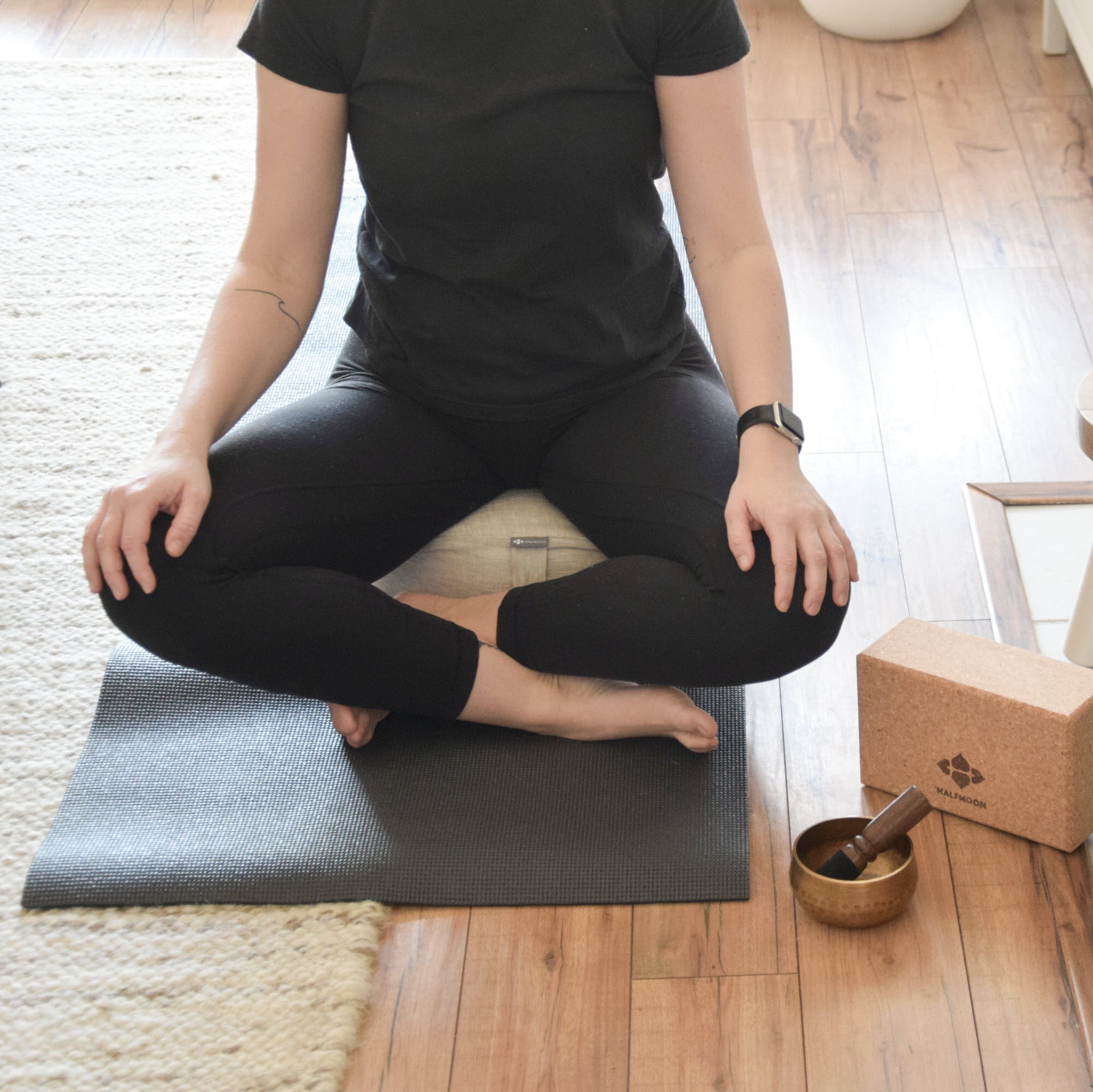 woman meditating on the mod meditation cushion